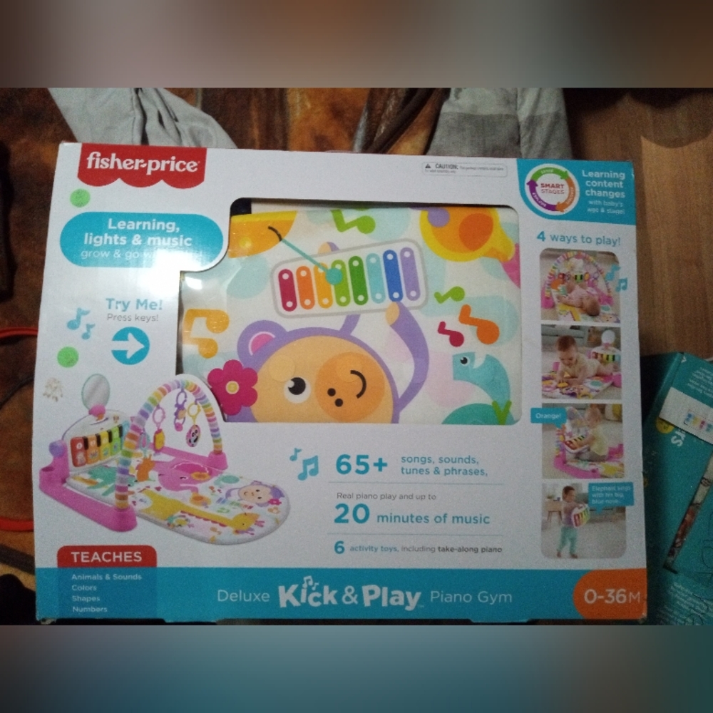 Fisher Price kick and play deluxe piano